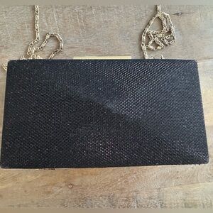 Natasha Couture Black Clutch with Gold Chain